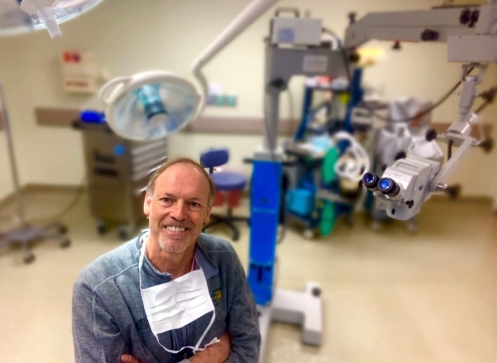 Dr. John McHugh in operating room.